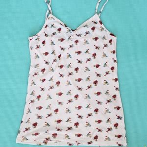 A white camisole Flowers on it